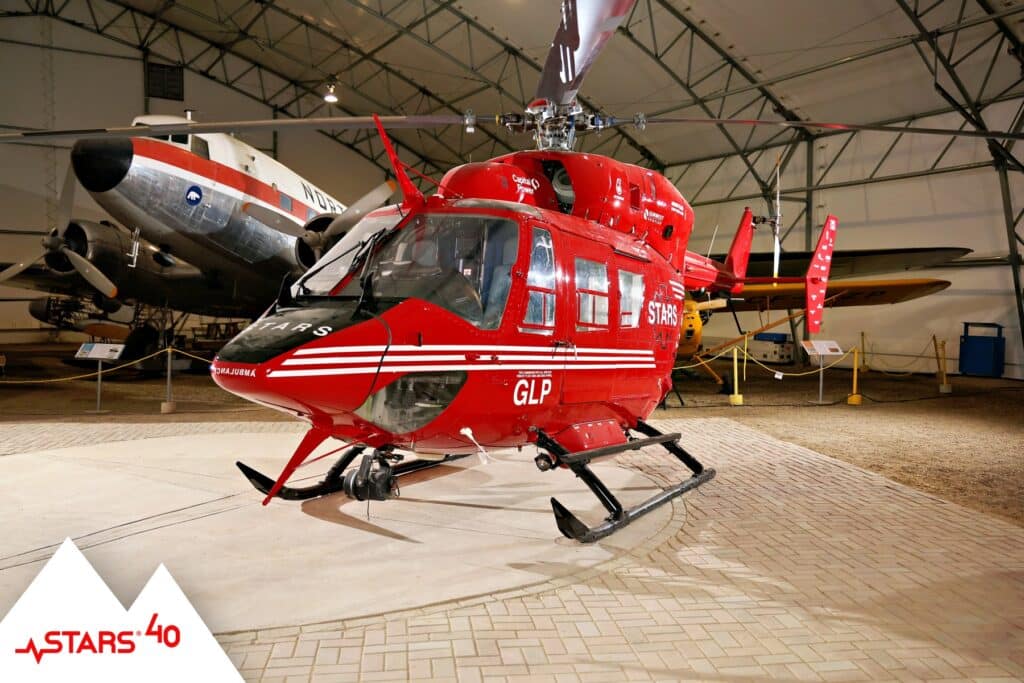 STARS BK117 helicopter on display at Hangar Flight Museum commemorating 40 years of service in